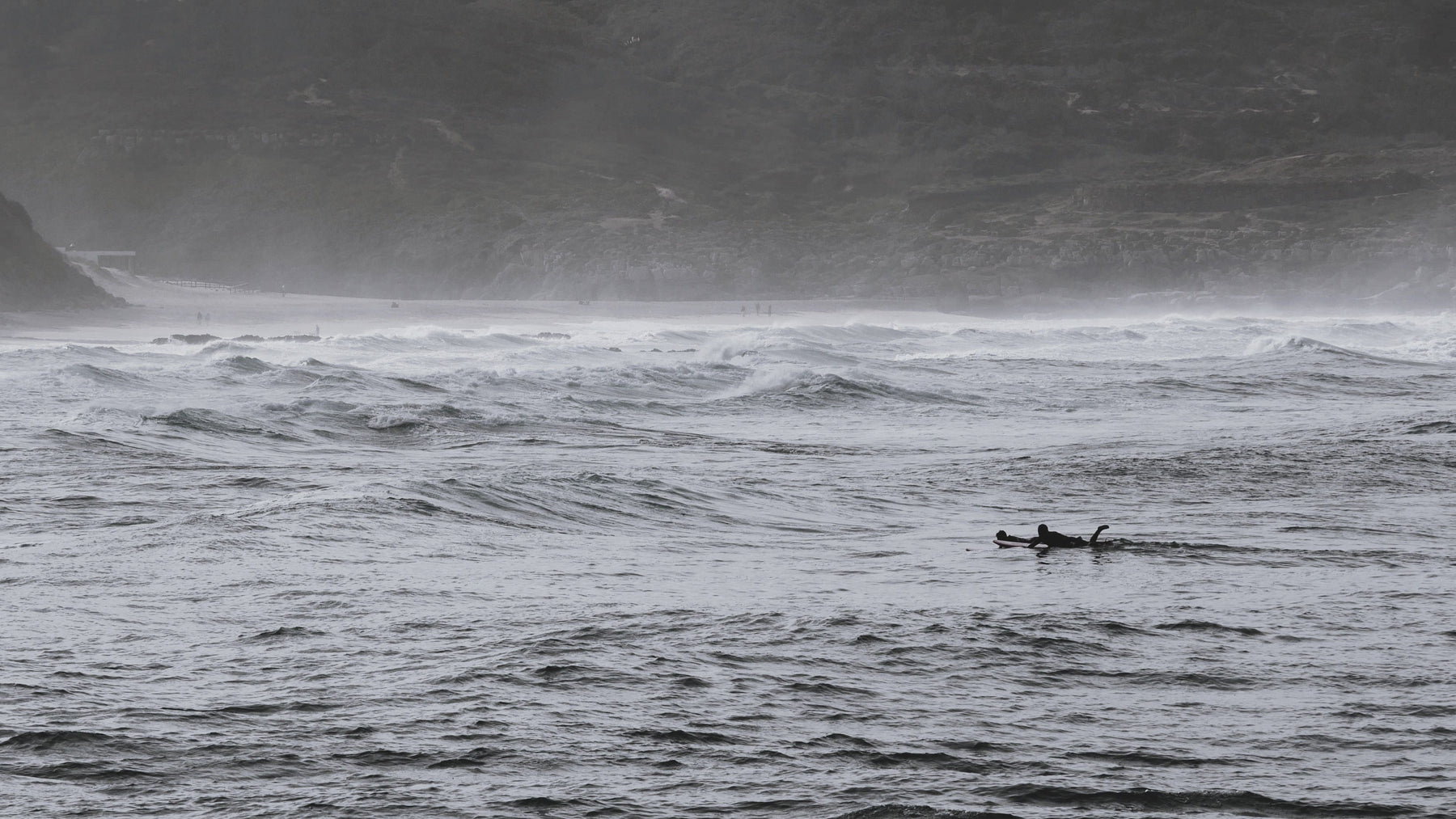 Surfers in the Atlantic waves at Ericeira, Portugal. Photo by Nelson Ferreira via Pexels.