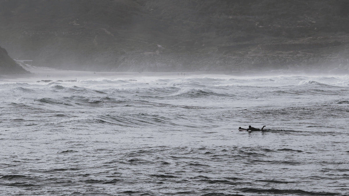 Surfers in the Atlantic waves at Ericeira, Portugal. Photo by Nelson Ferreira via Pexels.
